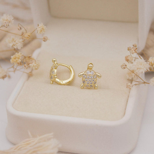 Turtuella Huggie Earrings