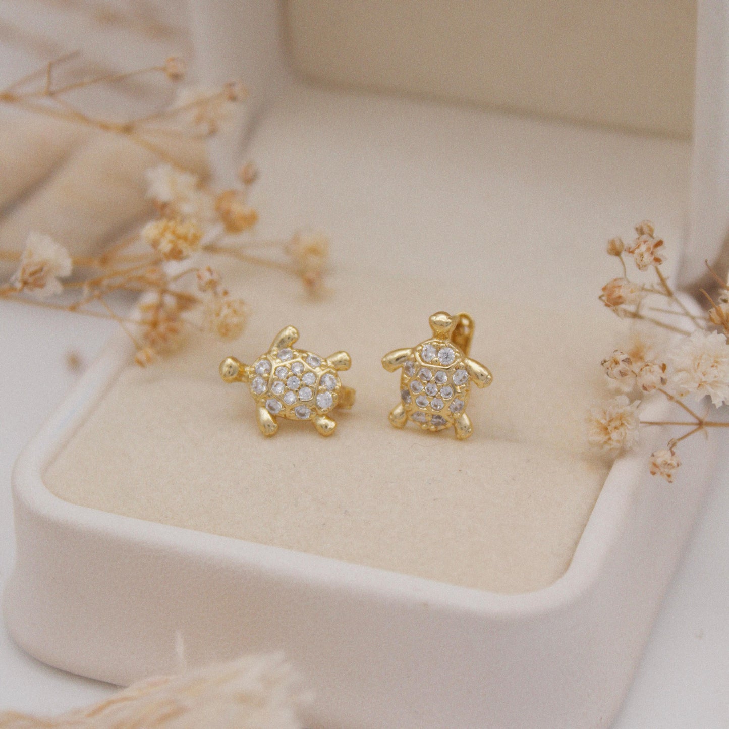 Turtuella Huggie Earrings