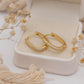 Della Huggie Earrings