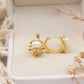 Aerith Pearl Huggie Earrings
