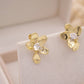 Crisanta Umbra Huggie Earrings